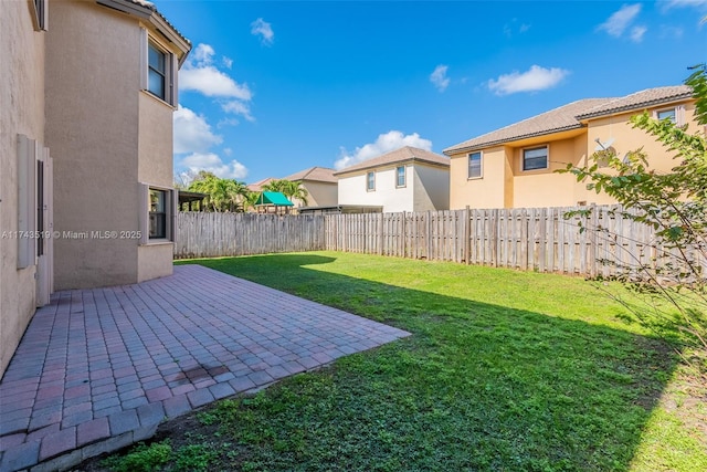 view of yard with a patio area