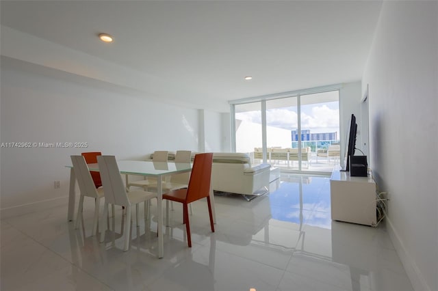 dining room featuring expansive windows