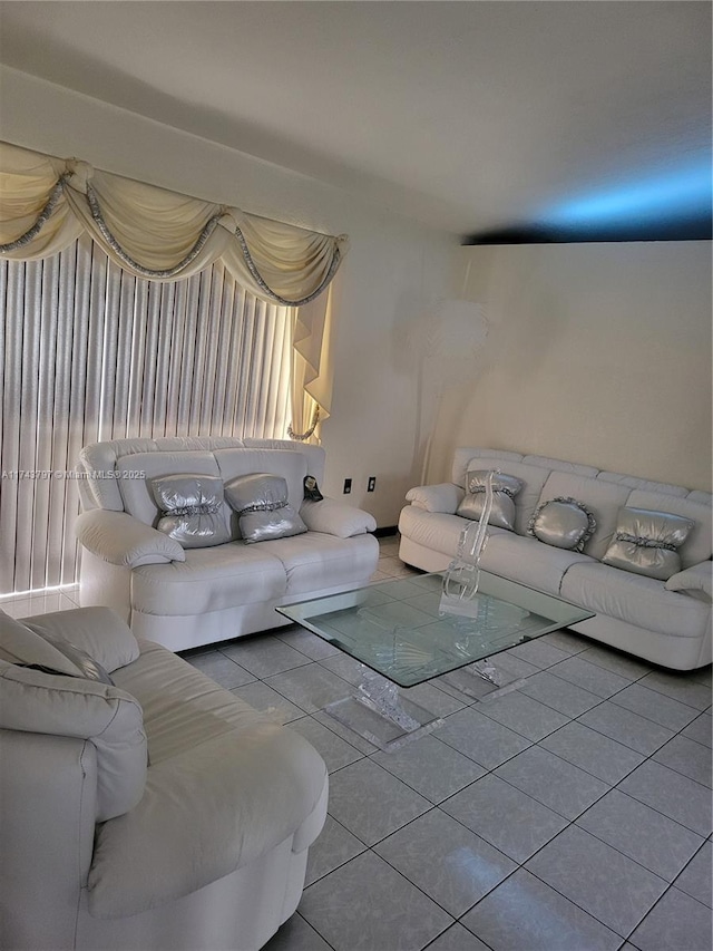 living room featuring light tile patterned flooring