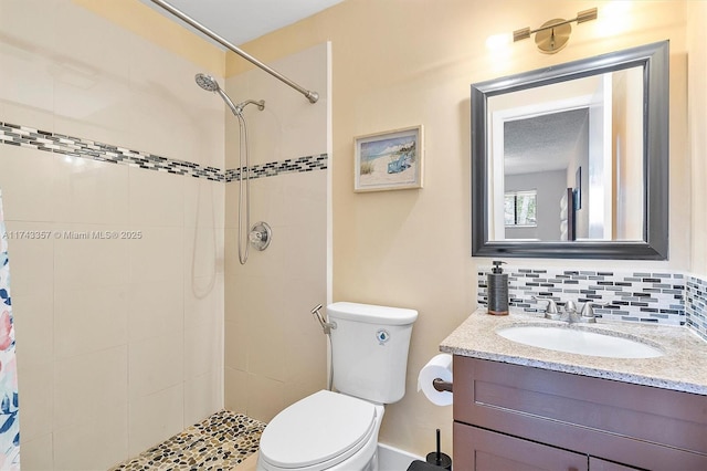 4149 S Pine Island Rd, Davie, FL 33328 - bathroom with vanity, tiled shower, and tasteful backsplash