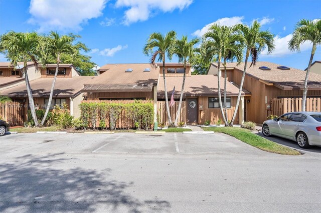 4149 S Pine Island Rd, Davie, FL 33328 - view of property featuring uncovered parking