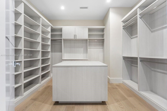 walk in closet featuring light wood-type flooring