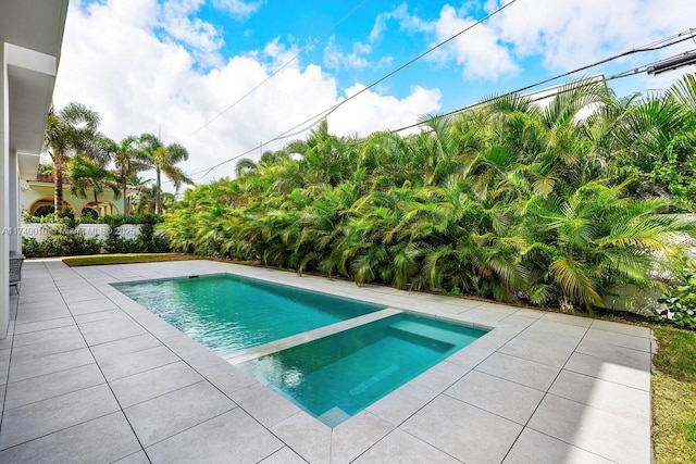 view of swimming pool featuring a patio