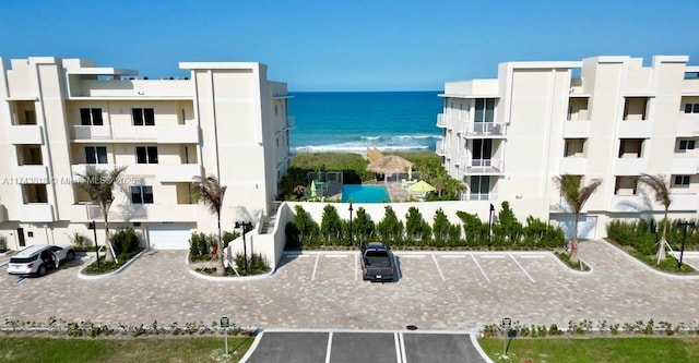 view of property with a water view