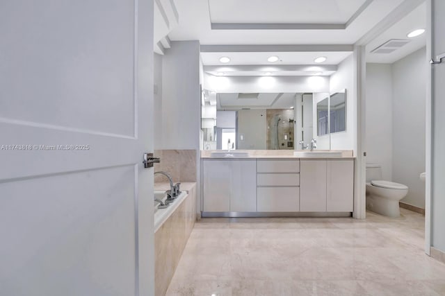 full bathroom with vanity, separate shower and tub, and toilet