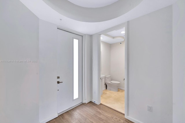 entrance foyer with light wood-type flooring