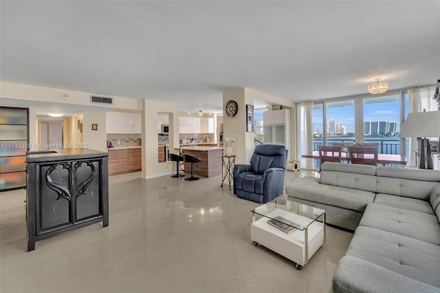 living room with light tile patterned floors