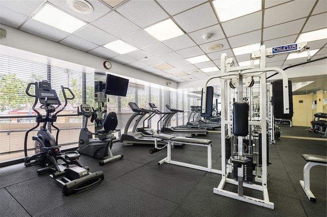 workout area with a drop ceiling