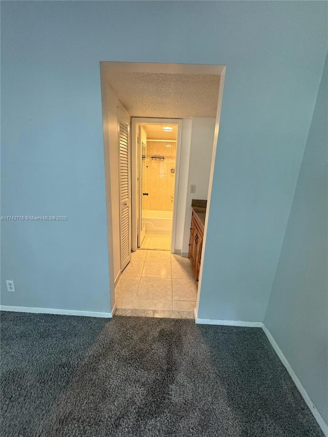 5155 E Sabal Palm Blvd Unit 204, Tamarac, FL 33319 - hallway with light carpet and baseboards