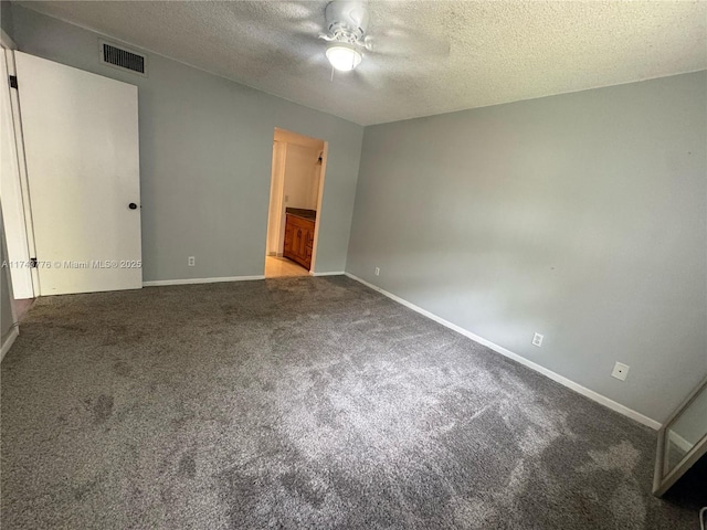 5155 E Sabal Palm Blvd Unit 204, Tamarac, FL 33319 - unfurnished bedroom featuring carpet flooring, a textured ceiling, ensuite bathroom, baseboards, and visible vents