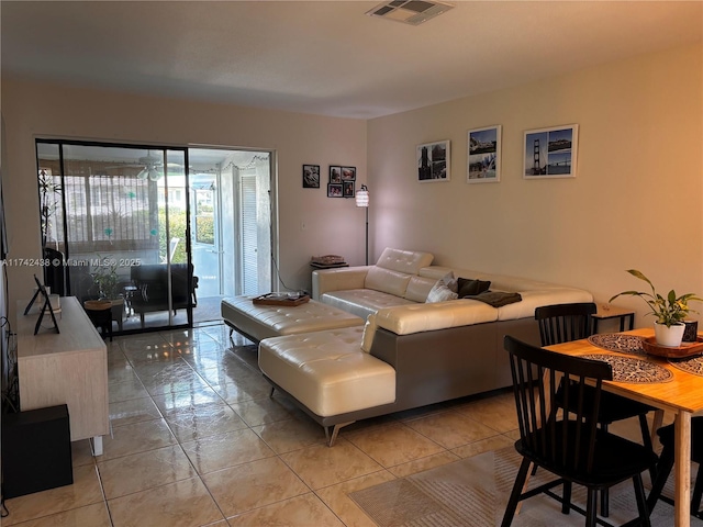 living room featuring light tile patterned floors