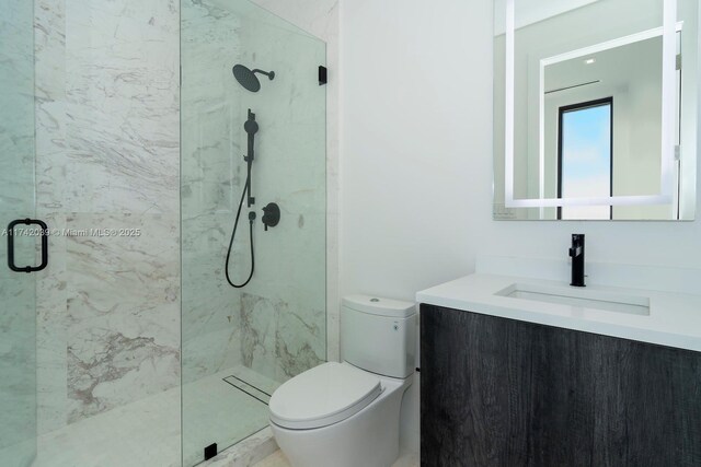 650 Lugo Ave, Coral Gables, FL 33156 - full bath featuring a marble finish shower, vanity, and toilet