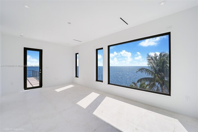 650 Lugo Ave, Coral Gables, FL 33156 - spare room with tile patterned flooring