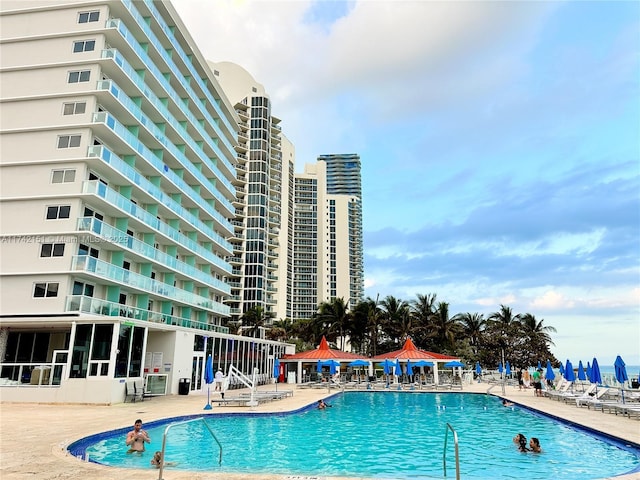 view of pool with a gazebo and a patio area