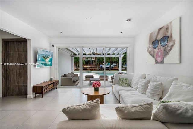 living room with tile patterned flooring