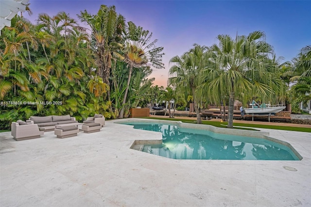 pool with a patio area