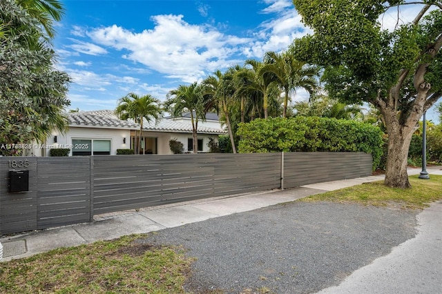 exterior space with a fenced front yard