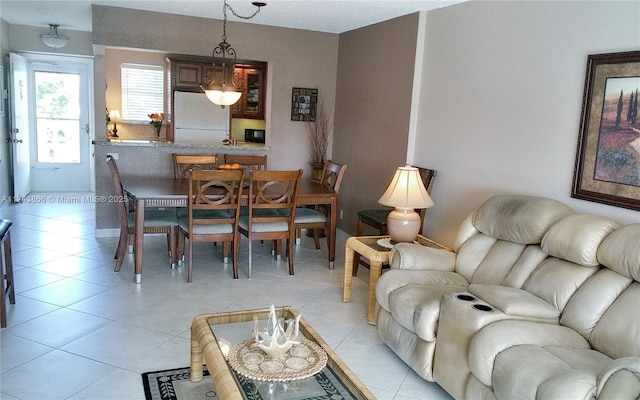 dining room featuring light tile patterned flooring