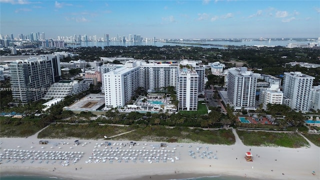 aerial view with a view of the beach and a water view