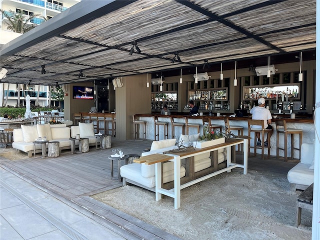 view of dock with an outdoor bar