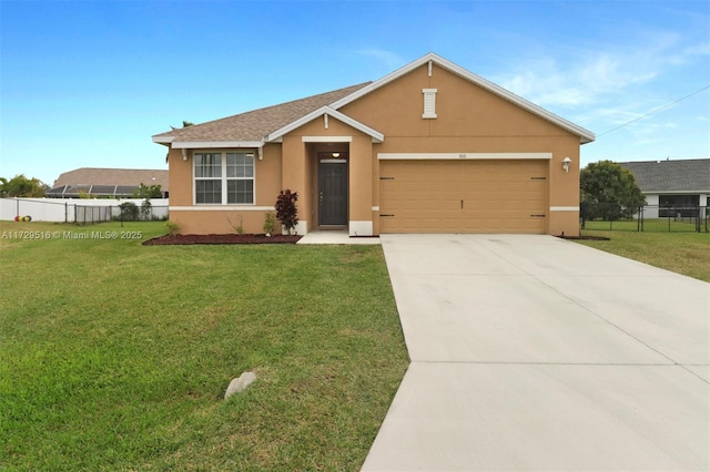 view of front of property featuring a front lawn, fence, and stucco siding