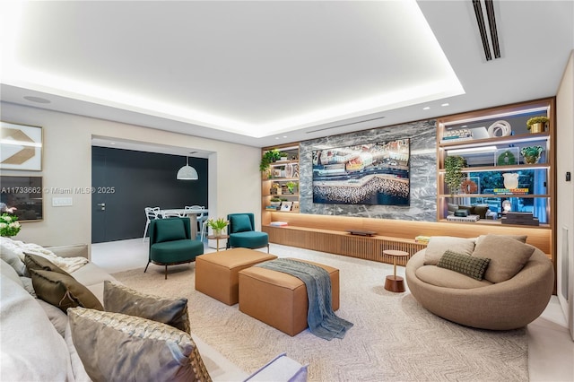 2415 San Domingo St, Coral Gables, FL 33134 - carpeted living room featuring a tray ceiling and visible vents