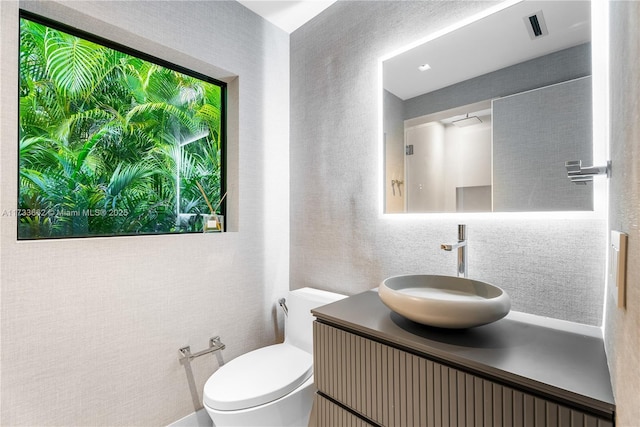 2415 San Domingo St, Coral Gables, FL 33134 - half bathroom featuring toilet, visible vents, and vanity