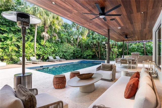 2415 San Domingo St, Coral Gables, FL 33134 - pool featuring a ceiling fan, outdoor dining area, exterior kitchen, and a patio