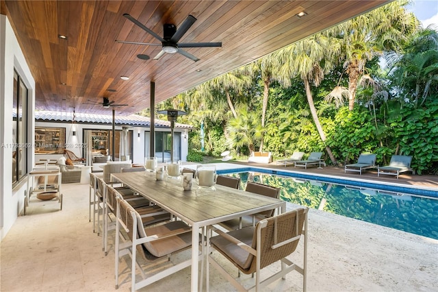 2415 San Domingo St, Coral Gables, FL 33134 - view of patio with an outdoor pool, ceiling fan, outdoor dining area, and an outdoor hangout area
