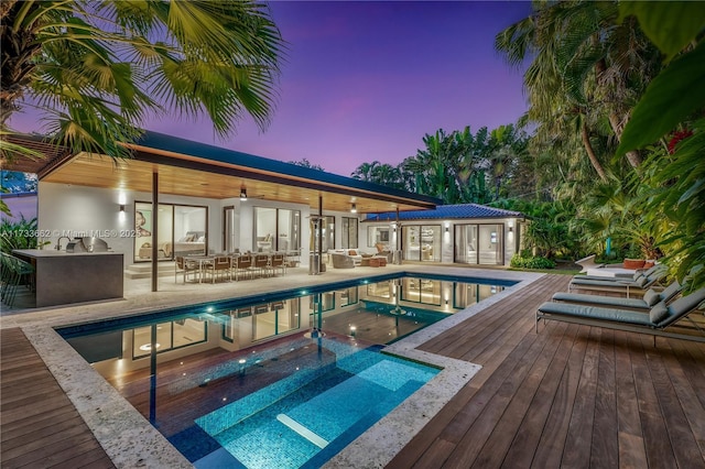 2415 San Domingo St, Coral Gables, FL 33134 - pool featuring a hot tub, outdoor dining space, a patio area, ceiling fan, and an outdoor structure