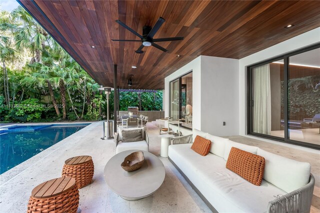 2415 San Domingo St, Coral Gables, FL 33134 - view of patio featuring an outdoor pool, outdoor lounge area, and a ceiling fan