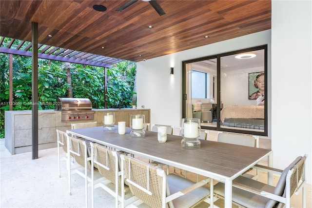 2415 San Domingo St, Coral Gables, FL 33134 - view of patio / terrace with ceiling fan, an outdoor kitchen, exterior bar, grilling area, and a pergola