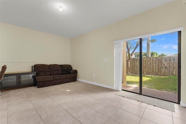 407 SE 32nd Ter, Homestead, FL 33033 - living area with light tile patterned floors