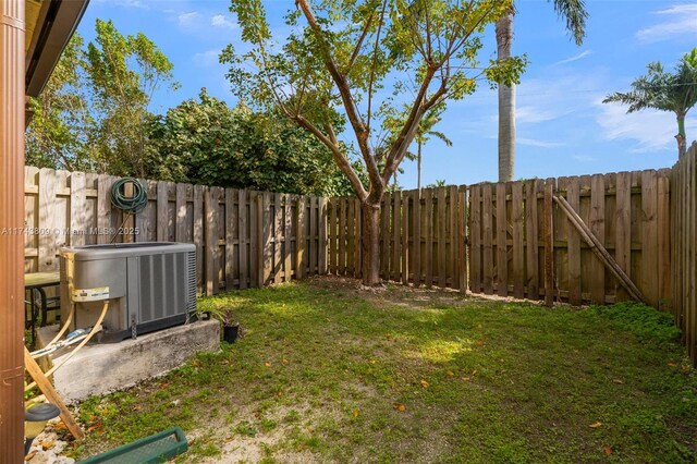407 SE 32nd Ter, Homestead, FL 33033 - view of yard featuring central air condition unit