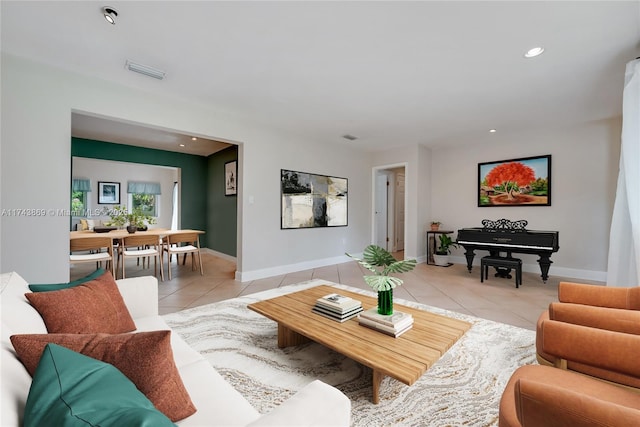 living room featuring light tile patterned floors