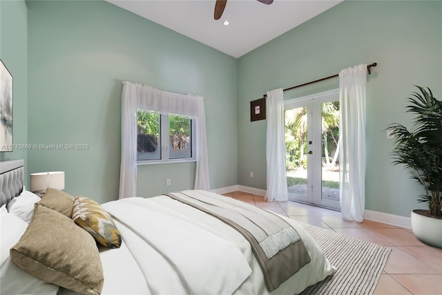 tiled bedroom with access to outside, ceiling fan, and french doors