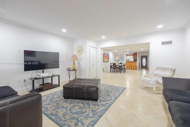 tiled living room with crown molding