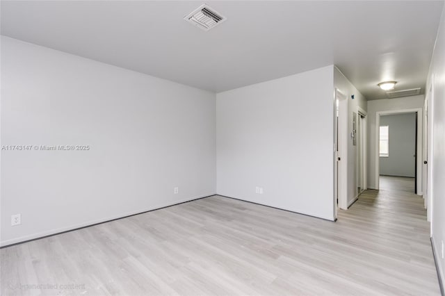 empty room featuring light hardwood / wood-style floors