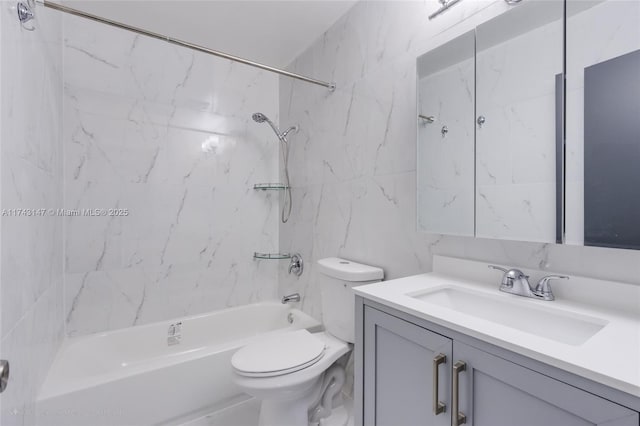 full bathroom featuring tile walls, backsplash, vanity, tiled shower / bath, and toilet