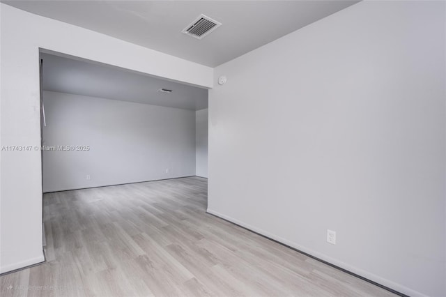 unfurnished room featuring light hardwood / wood-style flooring