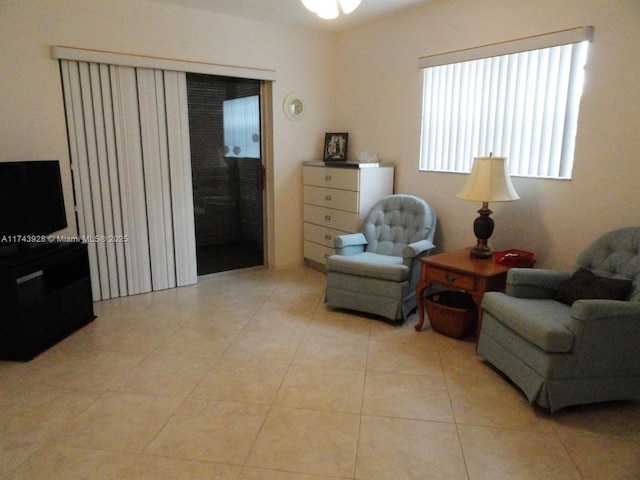 living area with light tile patterned flooring