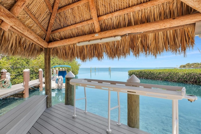 dock area with a water view and a gazebo