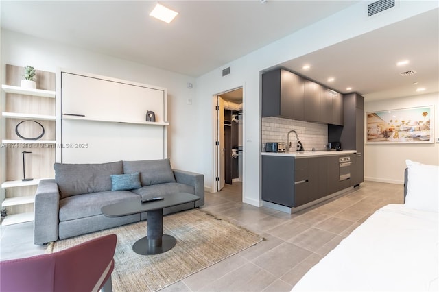 tiled living room with sink