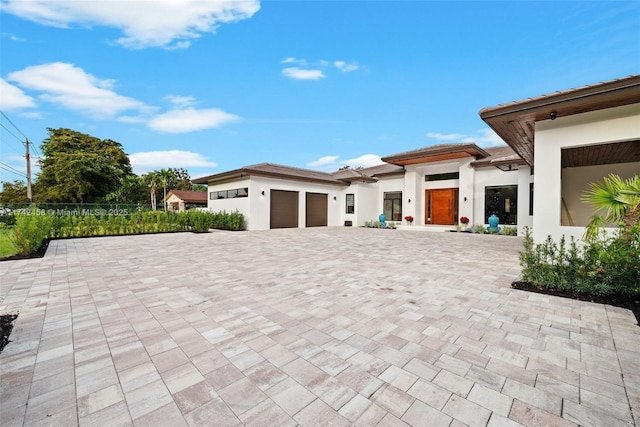 view of front of home with a garage