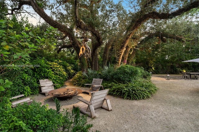 4725 Davis Rd, Miami, FL 33143 - view of yard with a patio and an outdoor fire pit