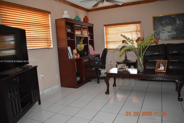 office area featuring a ceiling fan, light tile patterned flooring, and crown molding