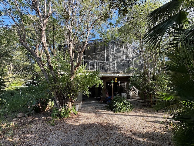 exterior space featuring a sunroom