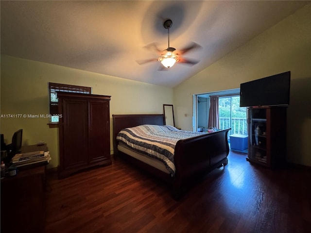 bedroom featuring vaulted ceiling, dark hardwood / wood-style floors, and ceiling fan