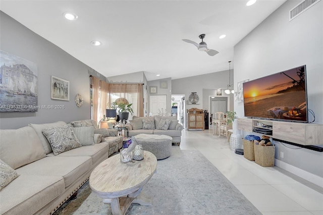 tiled living room with vaulted ceiling and ceiling fan