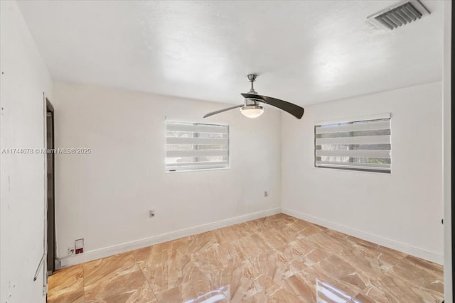 empty room featuring ceiling fan